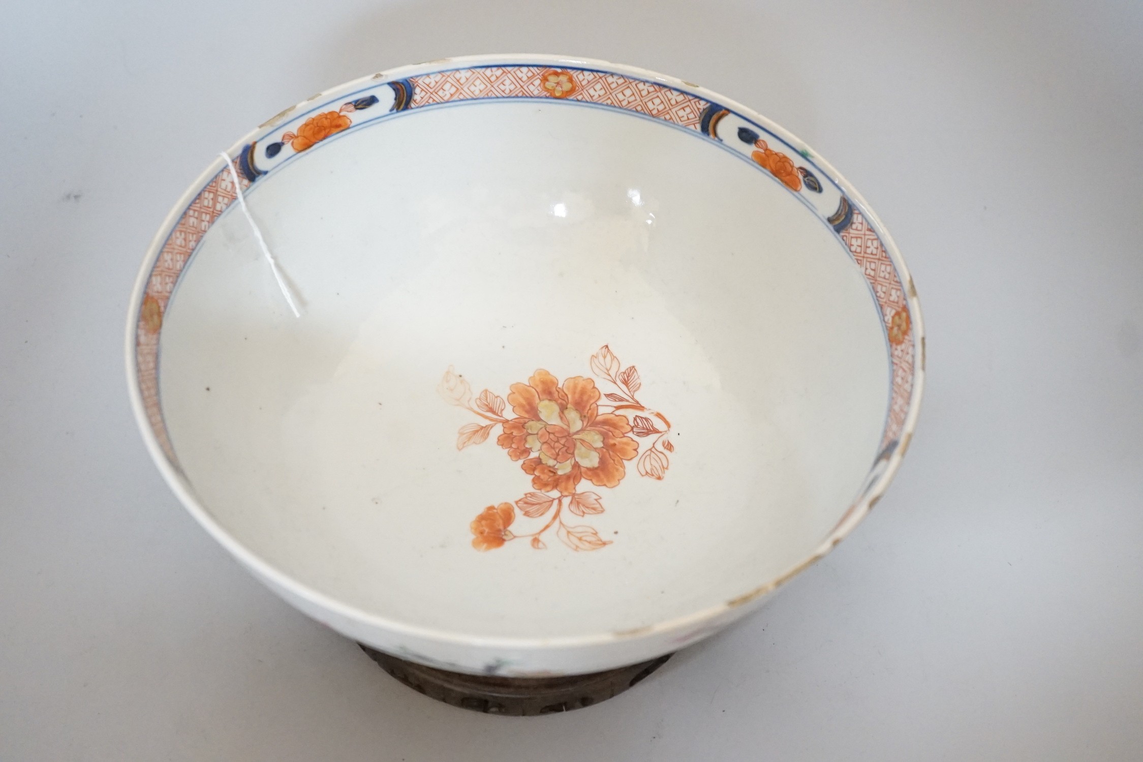 An 18th century Chinese famille rose bowl on wood stand, c.1740, diameter 26cm